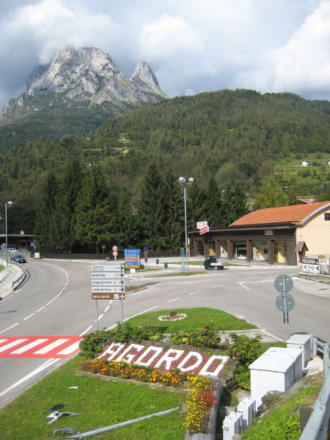 welcome to town town name spelled out in flowers