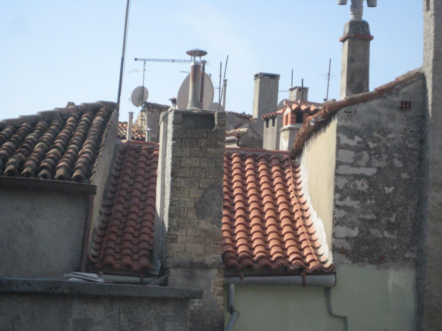 view from my room a jumble of tiled rooofs and old chimneys