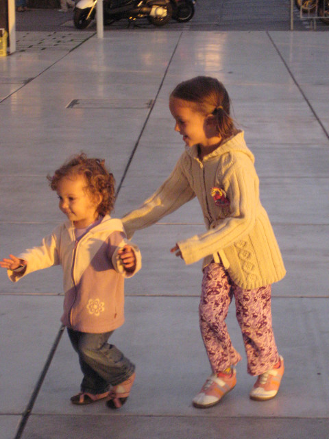Kids too little kid helping littler kid