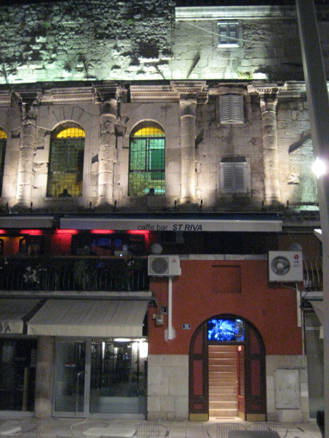 Night life moved in and up. bar & apts on roman wall