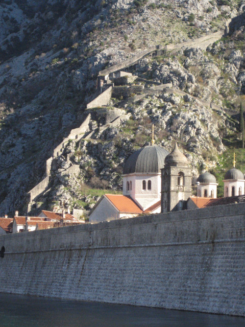river / moat River channeled along wall of the old city