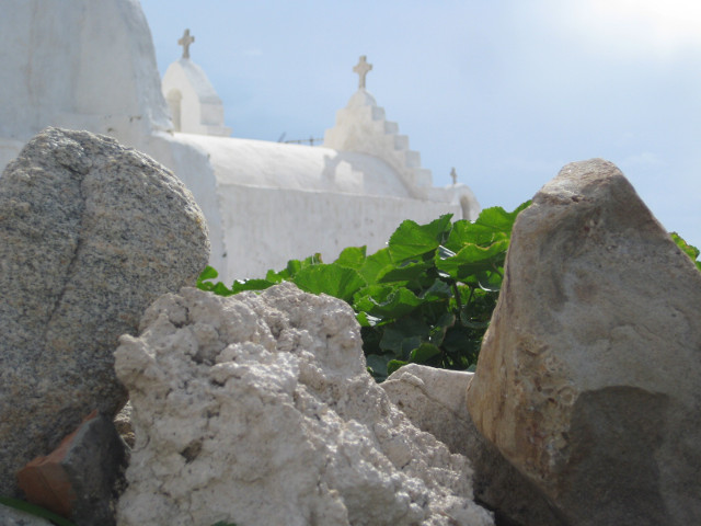 same church, less melted church framed by rocks