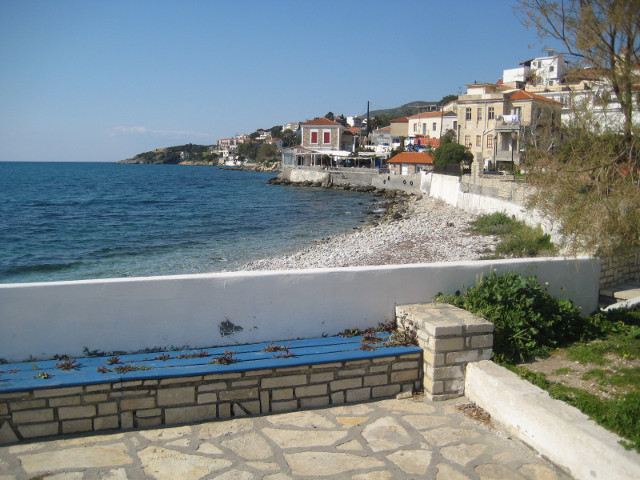 North by Northwest plaza overlooking east shore of Vathě sound
