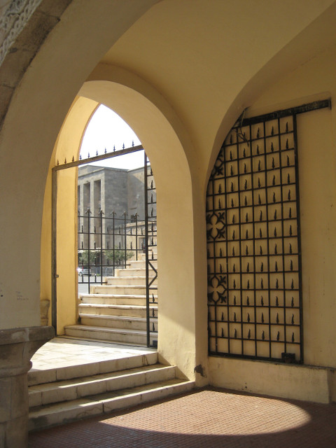 Arches near the old port view through 3 archways to outdoors