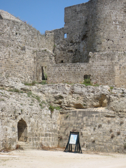 The city? through here. Massive walls with tunnel entrance near base