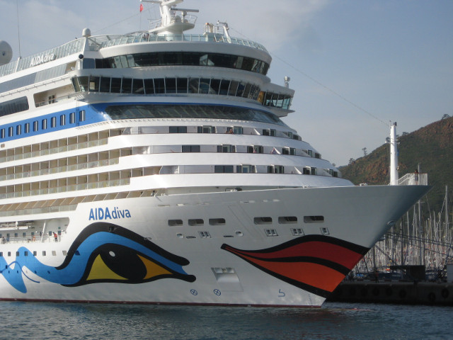 And he was the biggest he had seen huge cruise ship with lipsticked lips painted on front