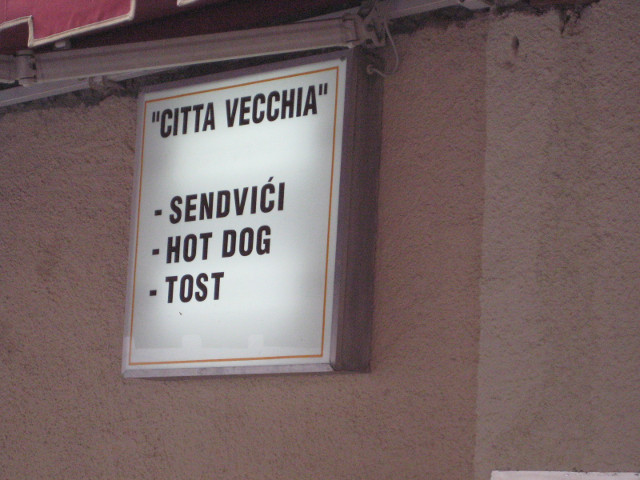 sandwiches, hot dog, toast sign with slavic-phonetic spelling