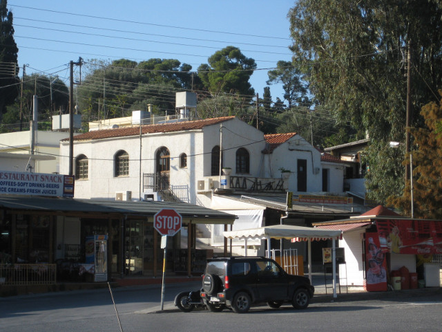 Modern Knossos White 2-story buildings, souvenir shack