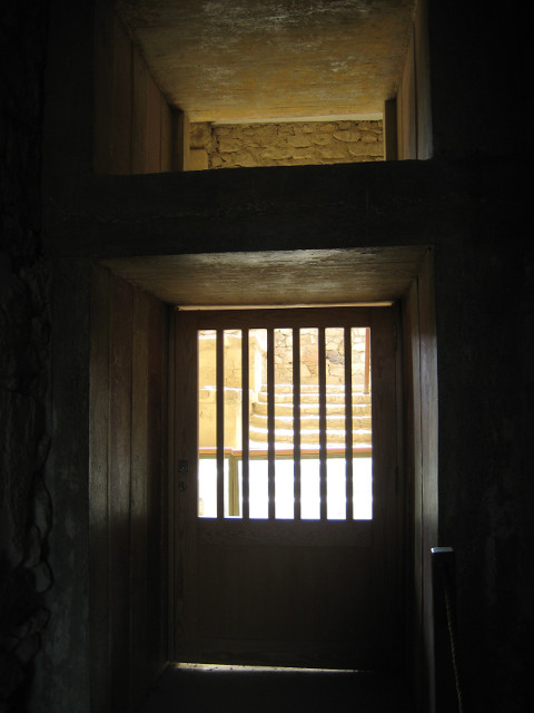 Looking Out dark hall with door to outside