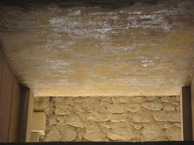 Transom ceiling lit from space over door to outside