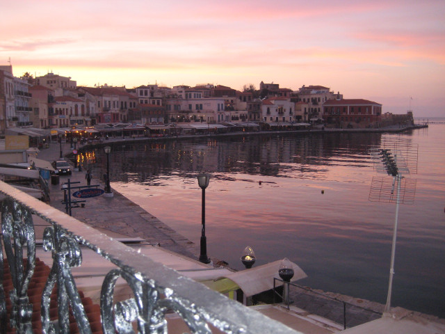 Sunset Time pinkish clouds across harbor from upstairs cafe balcony