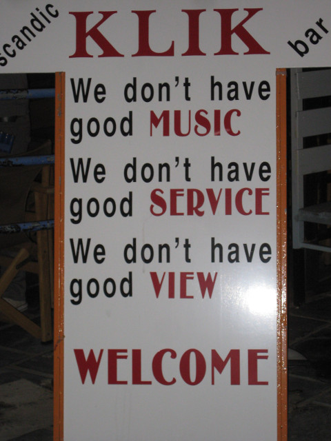 Klik Bar placard for bar near, buut not on the harborfront