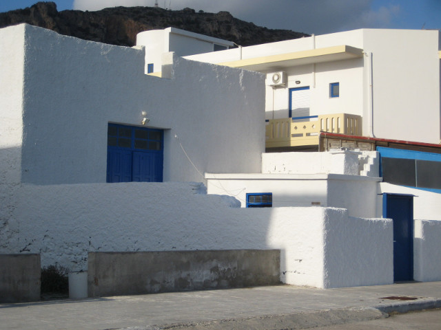 Cylcladic Houses whitewashed cubism with blue trim