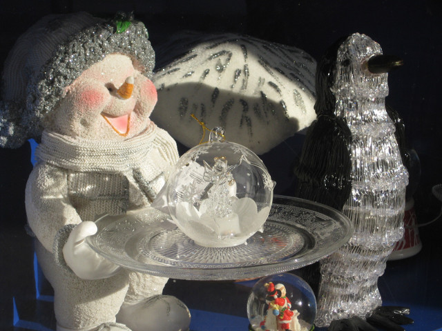Santa's Comin' glass figures in shop display