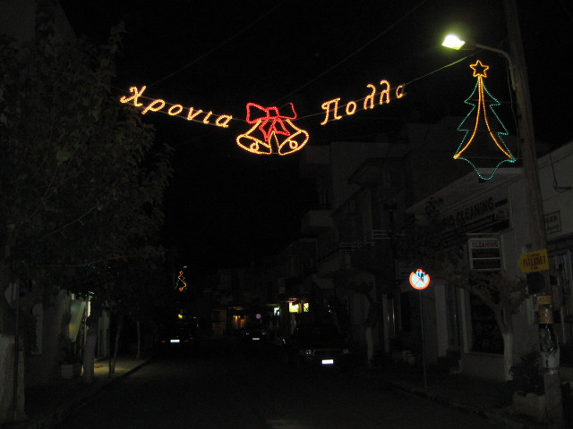 New Year Lights lights strung over mostly dark street