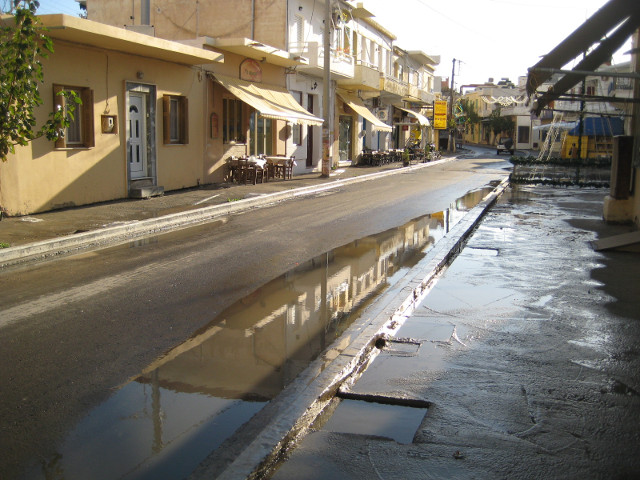 Puddlles to Jump light on puddles on main street of small town