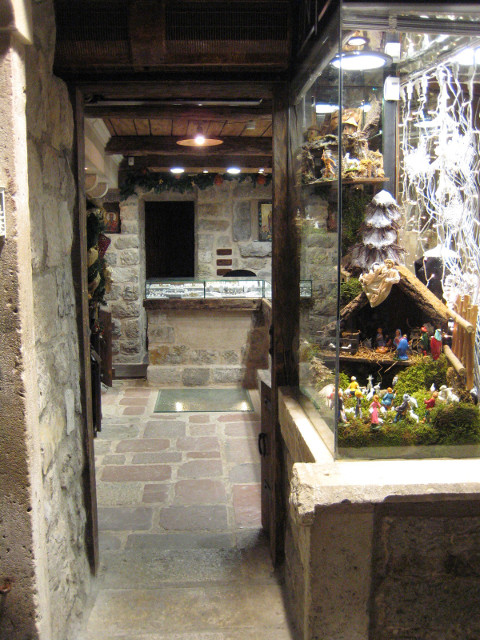 shop in old city street stone alley with display window