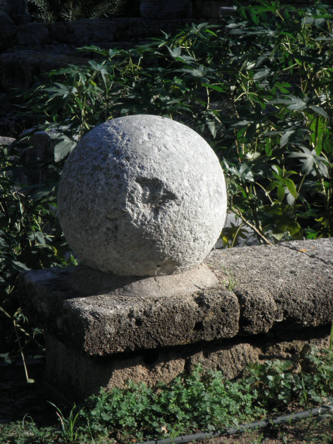 Cannon Ball on Garden Wall big stone ball on low wall
