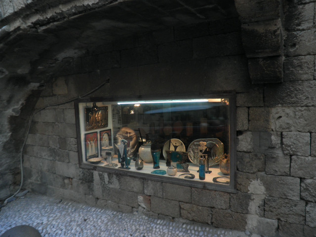 Shop in the Wall jewellry shop window in old stone wall