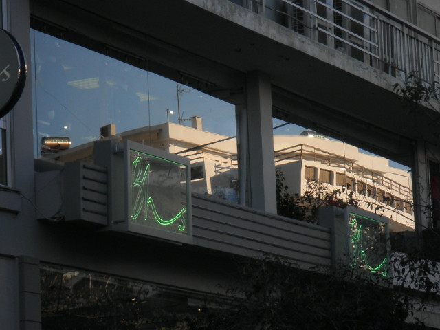 Modern Reflections modern building reflected in second floor window