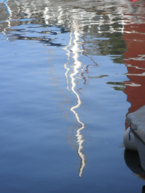 mast yacht mast reflect in water