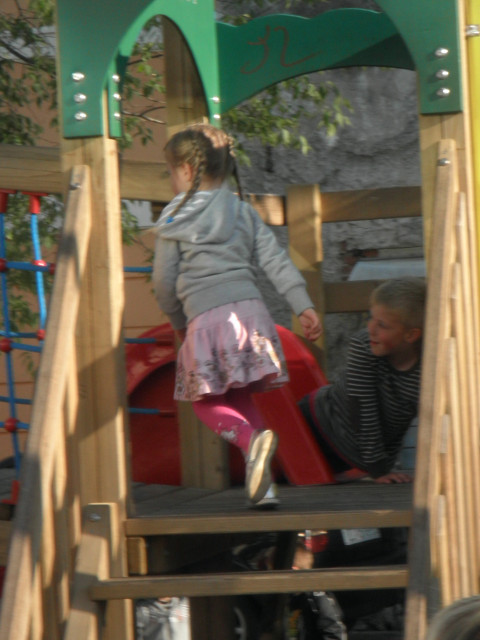 default title young girl on playground equipment