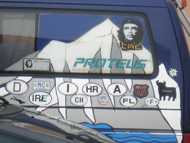 Party Poppers? van with many country stickers some pictures, and C. Guevara