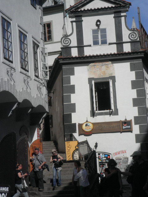 Foot of the Castle Stairs grey and white painted building facades