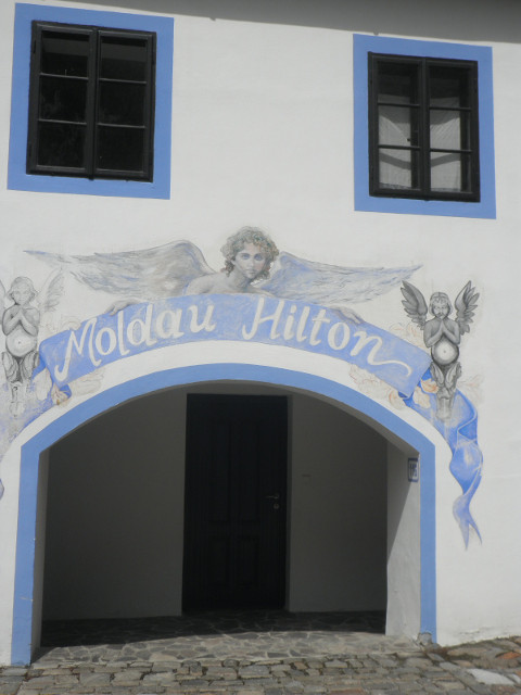 Moldau Hilton whitewashed building with blue trim