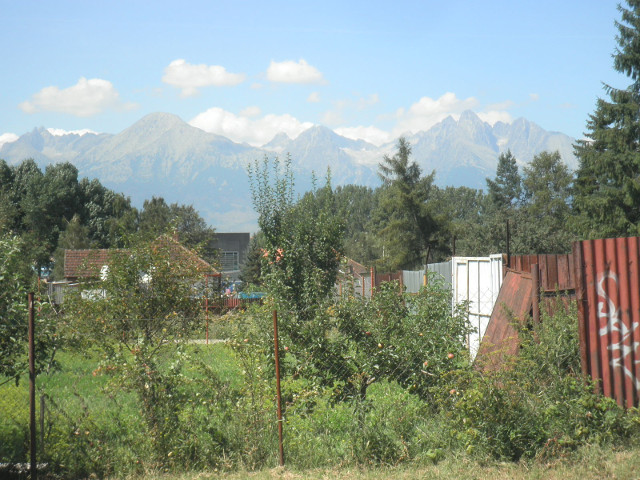 The High Tatras field with jaggedy mountains on the horizon
