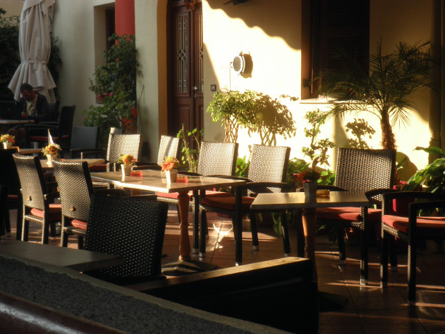 Mango Bar Terrace sunlit biut empty cafe terrace